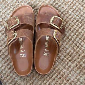 Birkenstock, big buckle 37N. Cognac color. Like new. Never worn outside .
